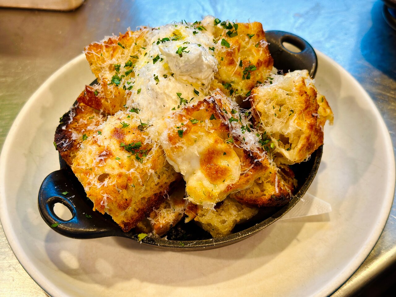 North Italia signature dishes BologneseThe Pig PizzaWhite Truffle Garlic Bread